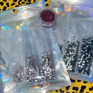 Rhinestone’s amethyst color and a blue 2 packs 2,400 Stones total 💅🏾